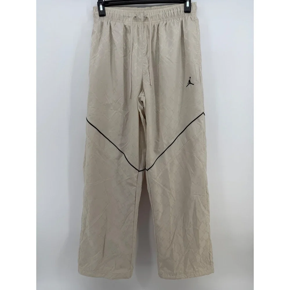 Nike Jordan Jumpman AOP Track Pants Mens M Beige Cream Wide Leg Adjustable Hem